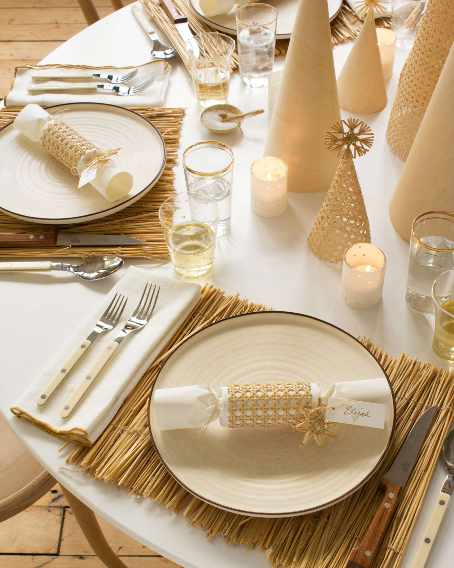 A DIY party popper (also known as a Christmas cracker) adorns each place setting.