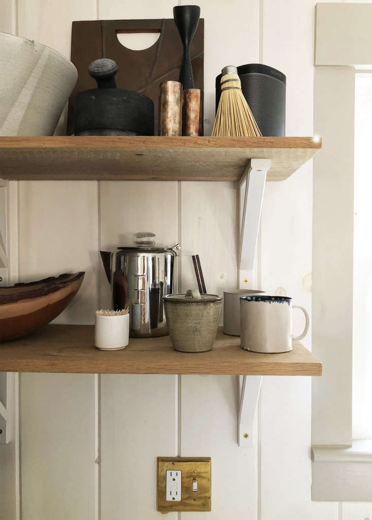 the open shelves on the back wall are made of reclaimed oak barn boards and pai 21