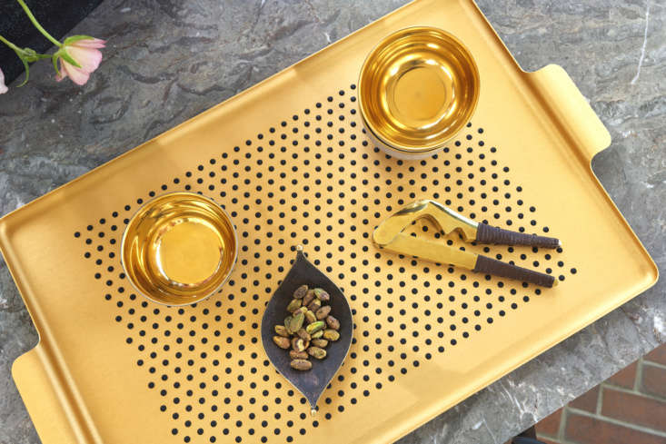 made of aluminum, the kaymet pressed tray with dot grips (from \$\1\10, shown i 21