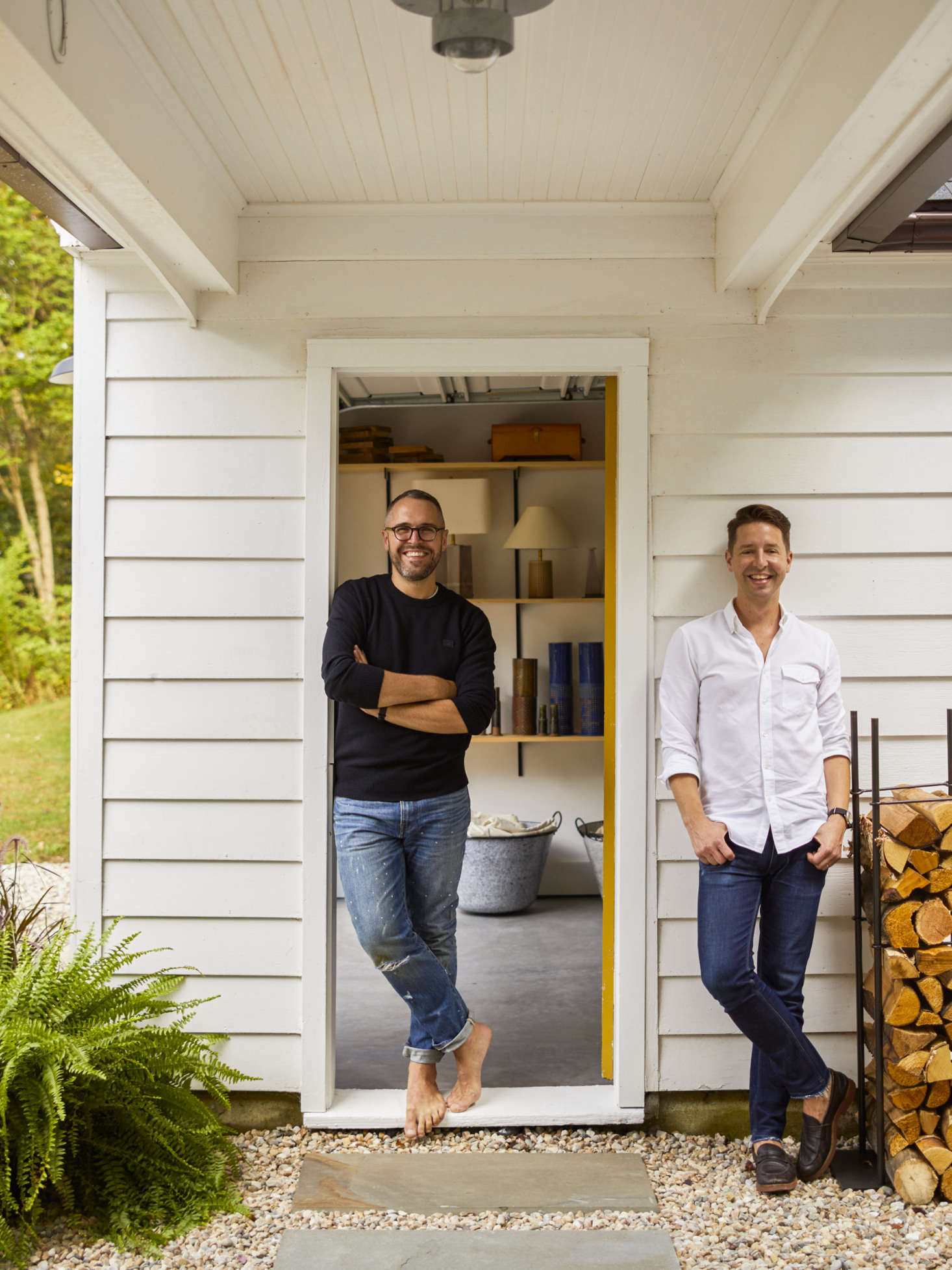 Charlie (L) and Keven (R) in the breezeway that links the kitchen door to the garage that they converted into Charlie