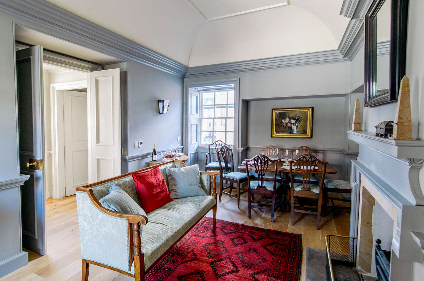 The living space on the top floor is painted Manor House Gray.