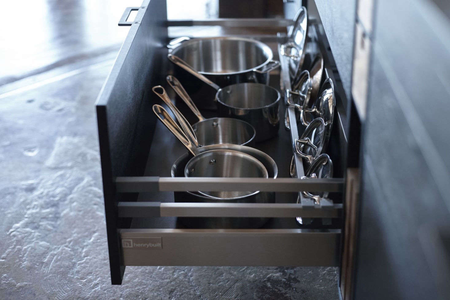 The Henrybuilt system includes deep, eminently practical drawers for pot and lid storage.