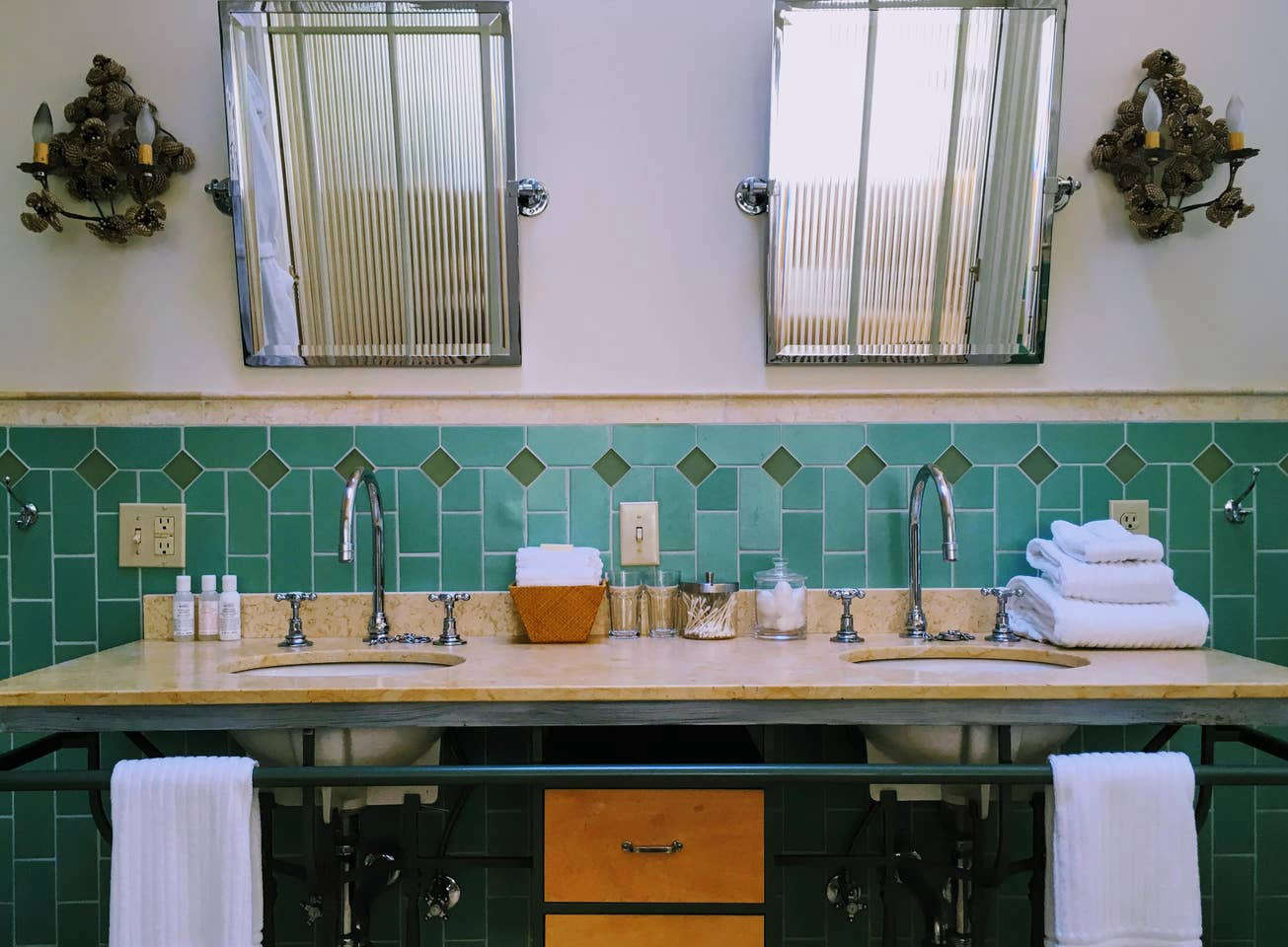 A green-tiled bathroom.