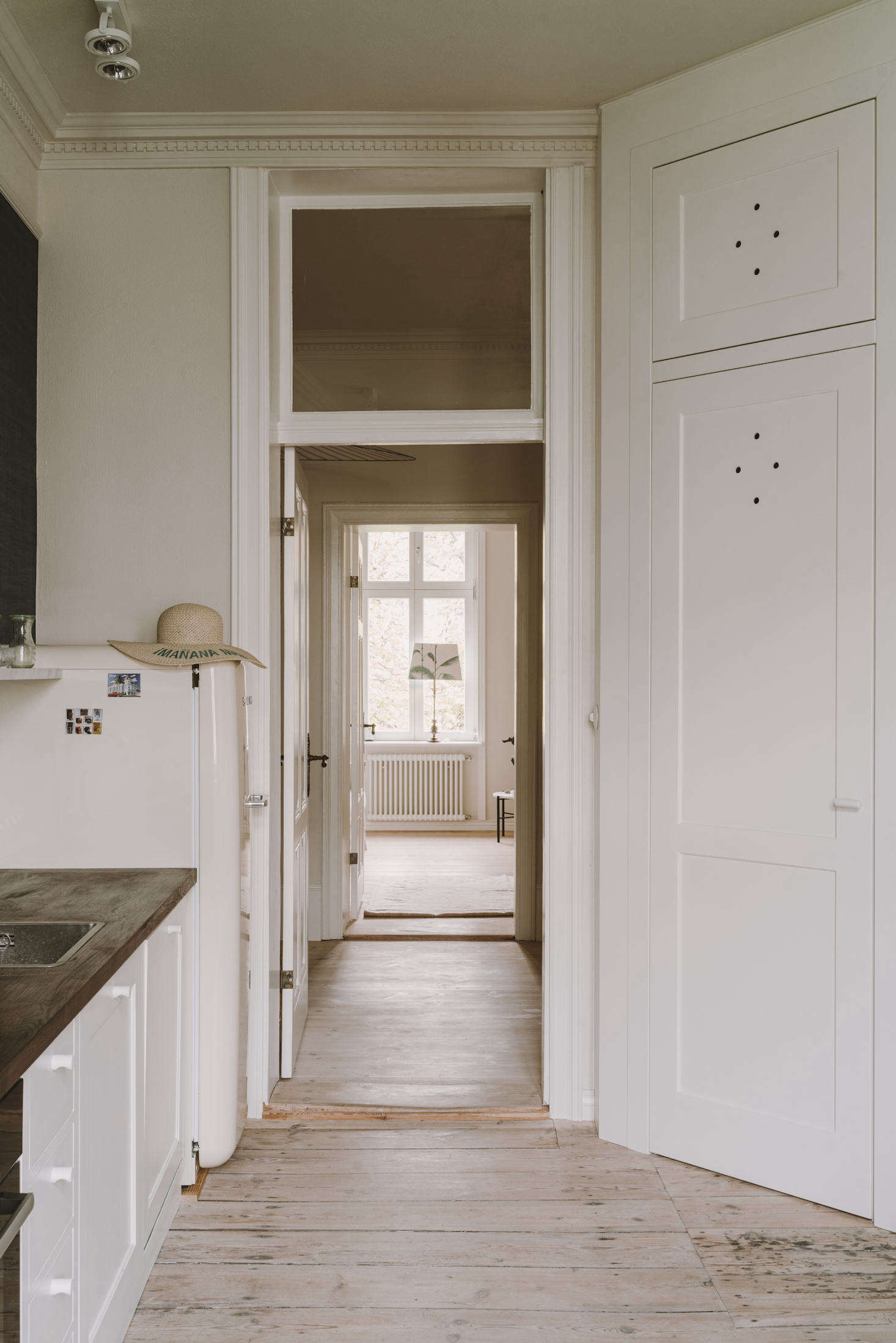 The countertop is stained oak. The cabinet and drawer knobs are custom.