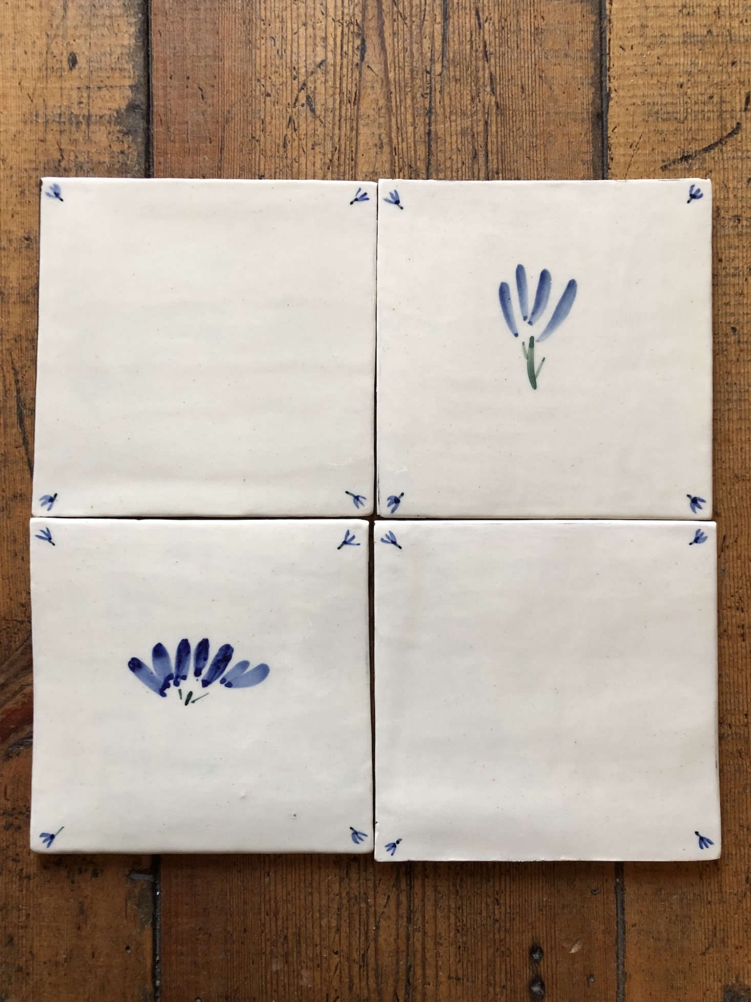 A quartet of blue tiles.