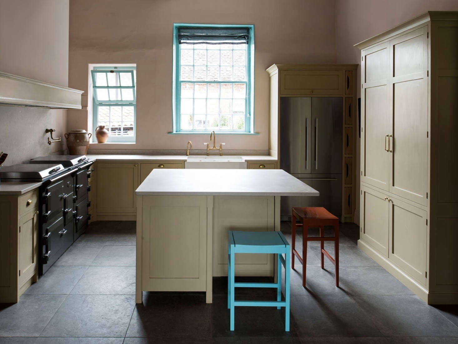 Shades of brown are offset with bright turquoise green paint. Photography by Leigh Simpson, courtesy of Inglis Hall from Kitchen of the Week: An Unexpected Palette in a Custom Kitchen Designed by Inglis Hall.