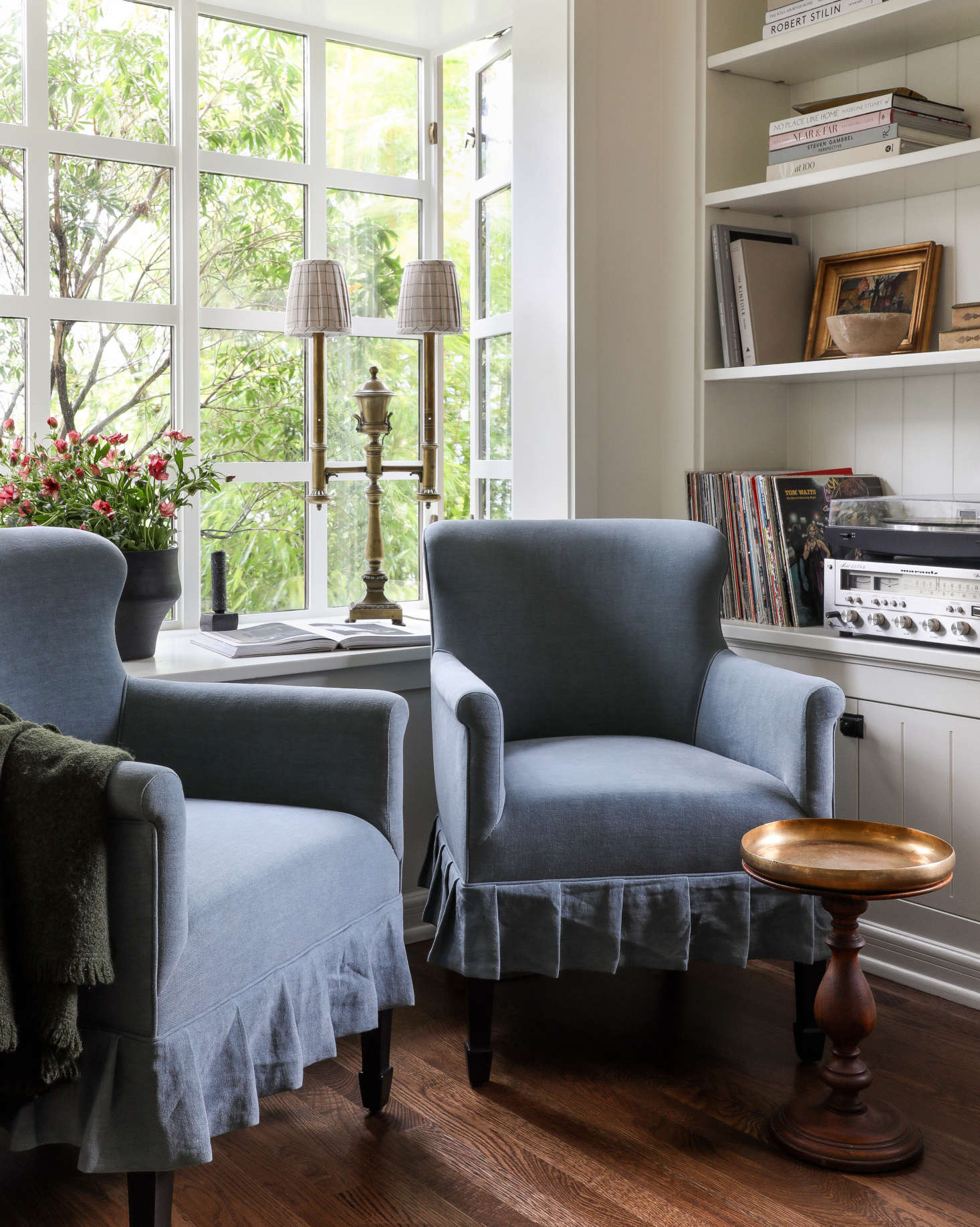 Tailored granny chic: Caillier designed skirted armchairs for the music corner of the room.