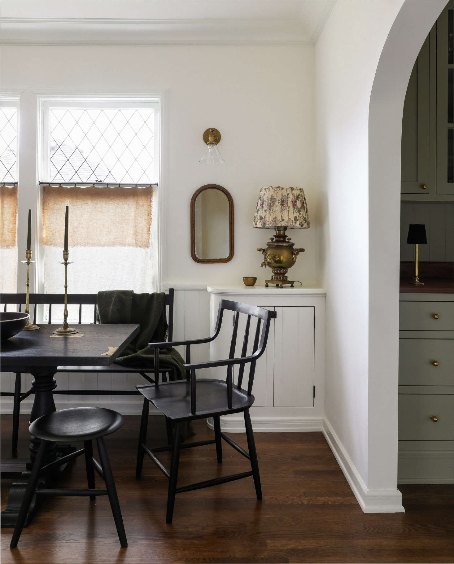 The dining table and chairs are Sawkille designs: the Springsteen Trestle Table, Senate Chair, and Dinner Stool.