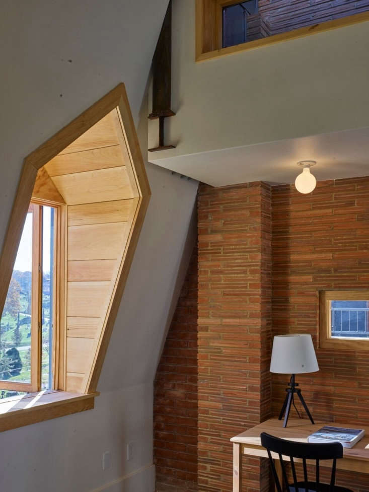 a roman brick wall adds another texture. note the simple porcelain ceiling ligh 32