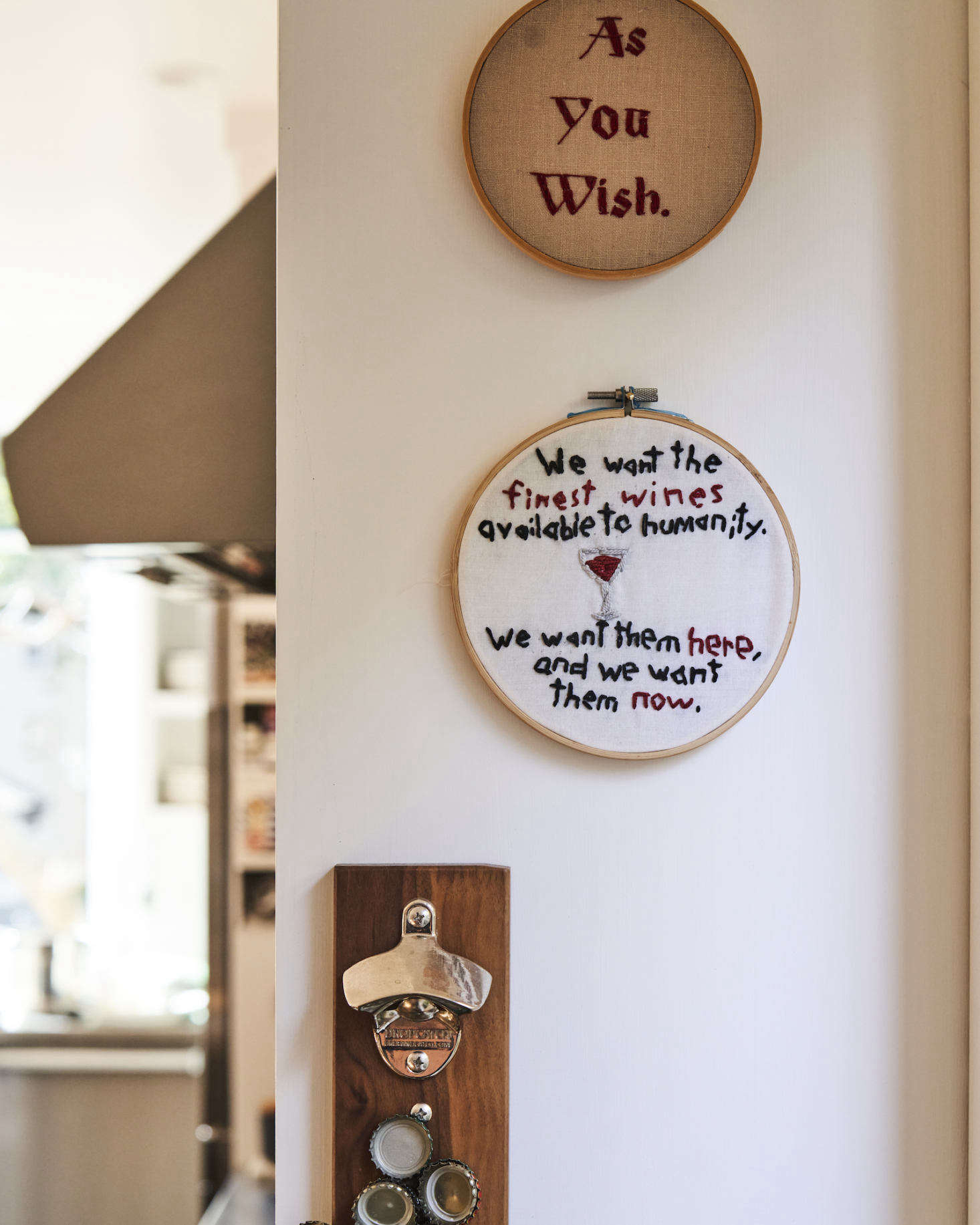 Two needlepoint pieces, bearing famous quotes from a couple of Matt
