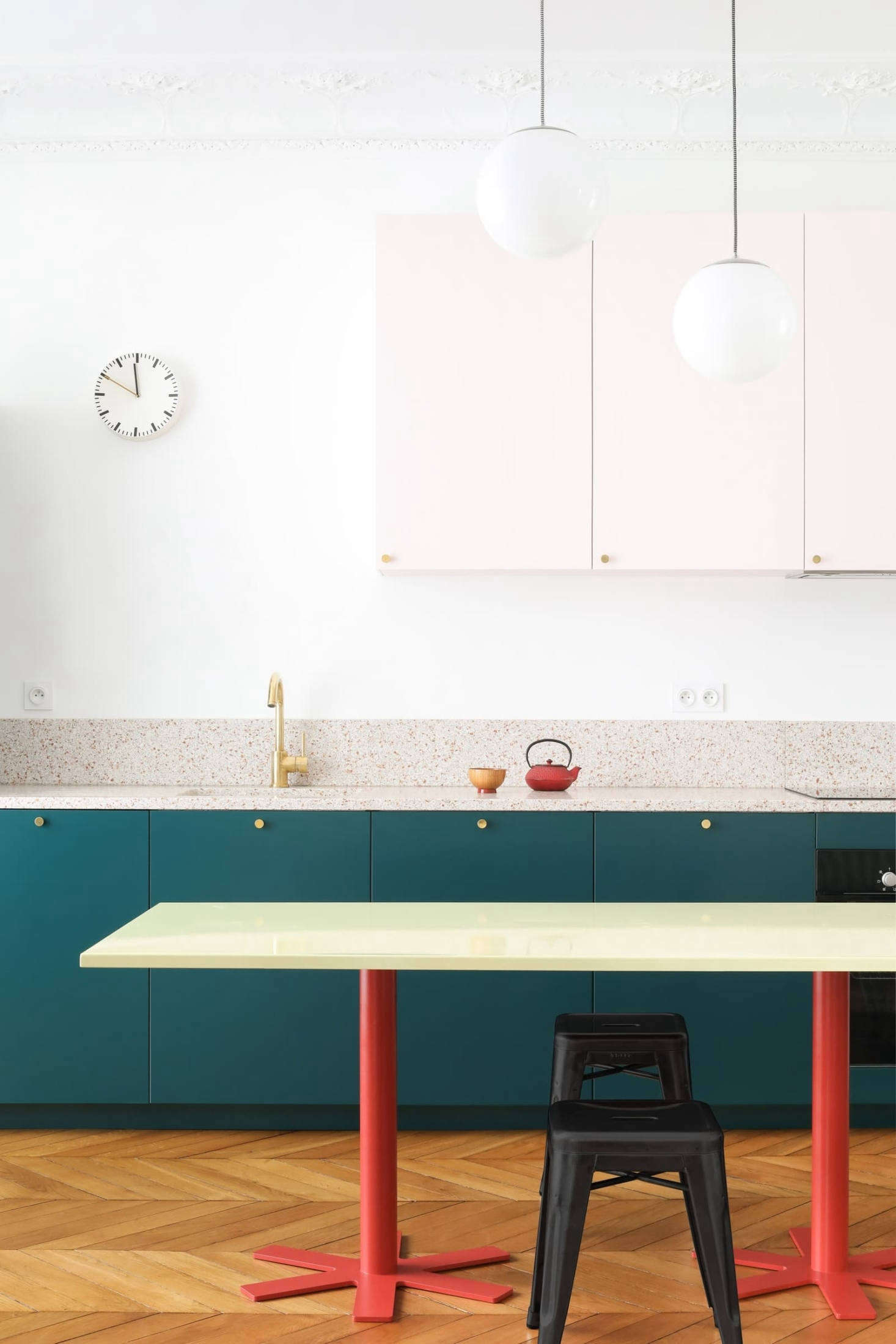 Tolix stools serve as unobtrusive seating.