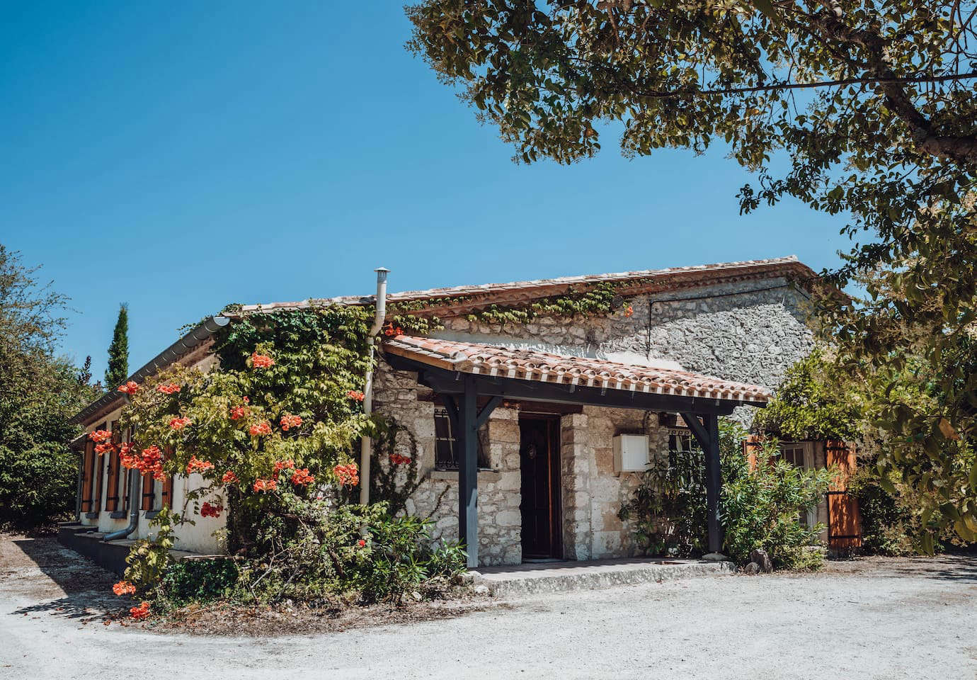 The converted barn is on a hilltop overlooking fields of sunflowers. The exterior remains untouched.