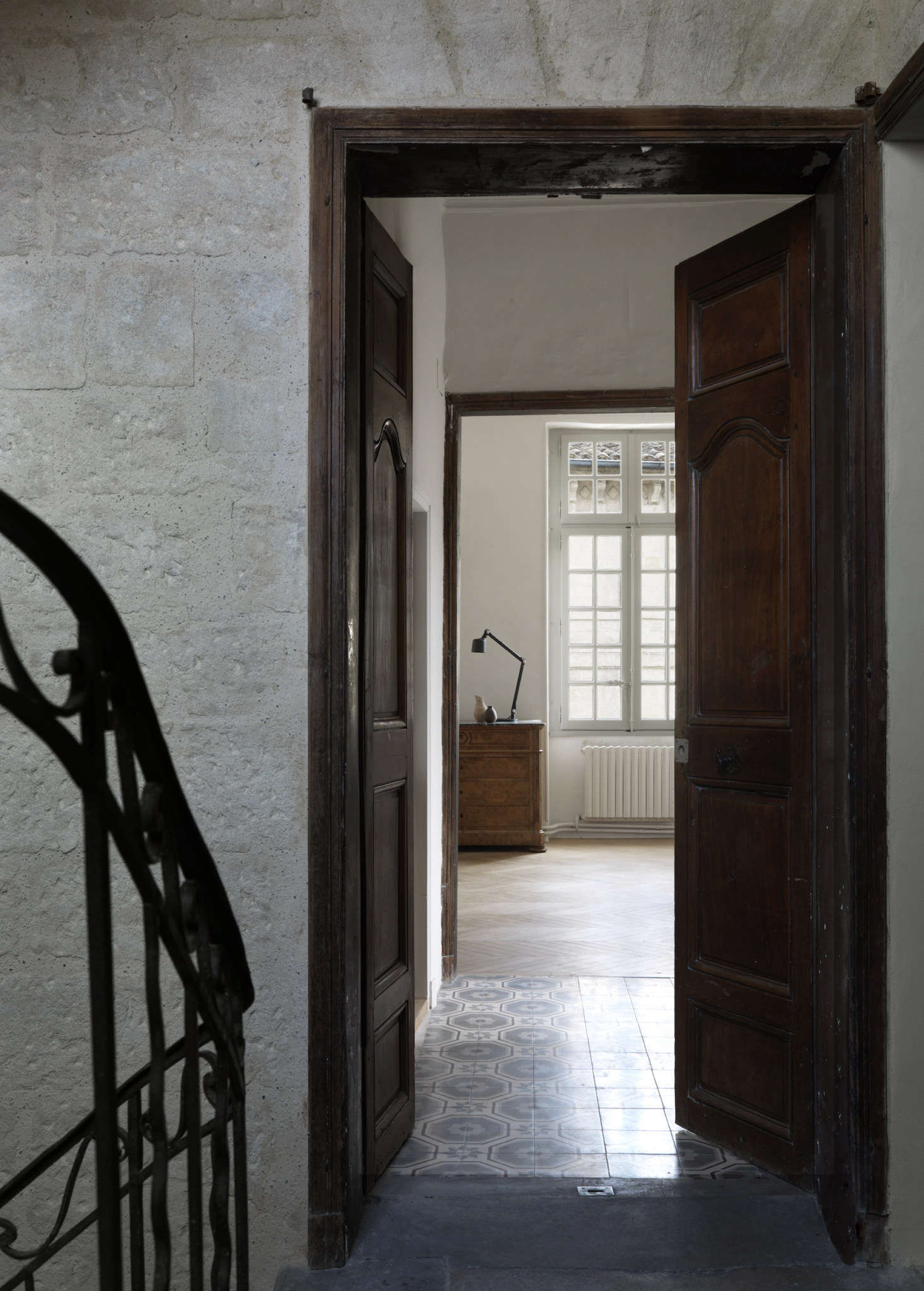 A peek from the landing into a bedroom.