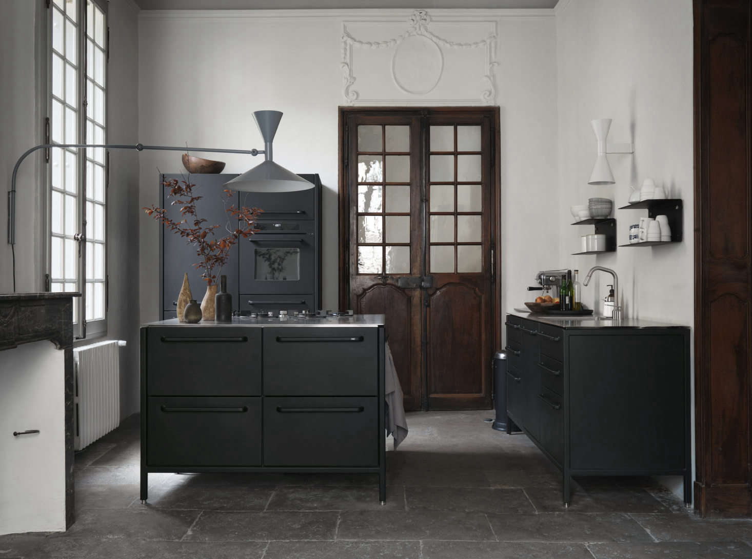 Three Vipp modules make up the kitchen. The legs can be adjusted, a useful feature when you