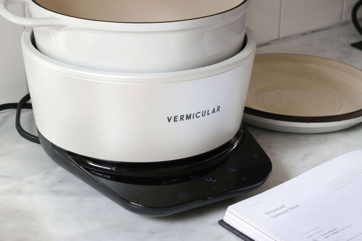 The Vermicular Musui is an enameled cast iron pot with a lid that