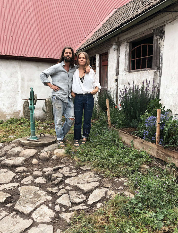 jacob and ellen in their back garden. the farmhouse is in the seaside town of & 17