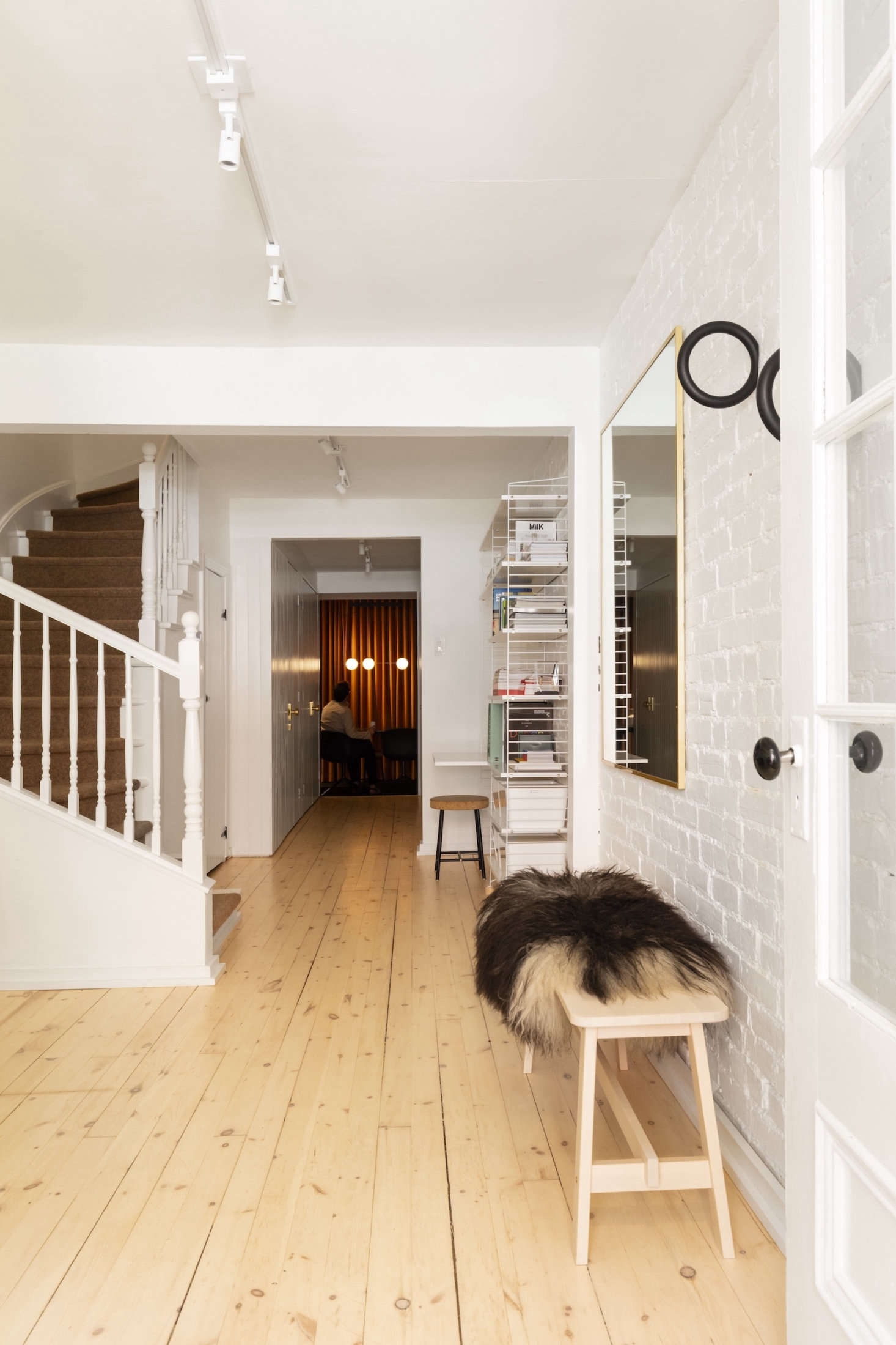 The front door leads to the ground floor, which Michael has turned into his dedicated design studio. 