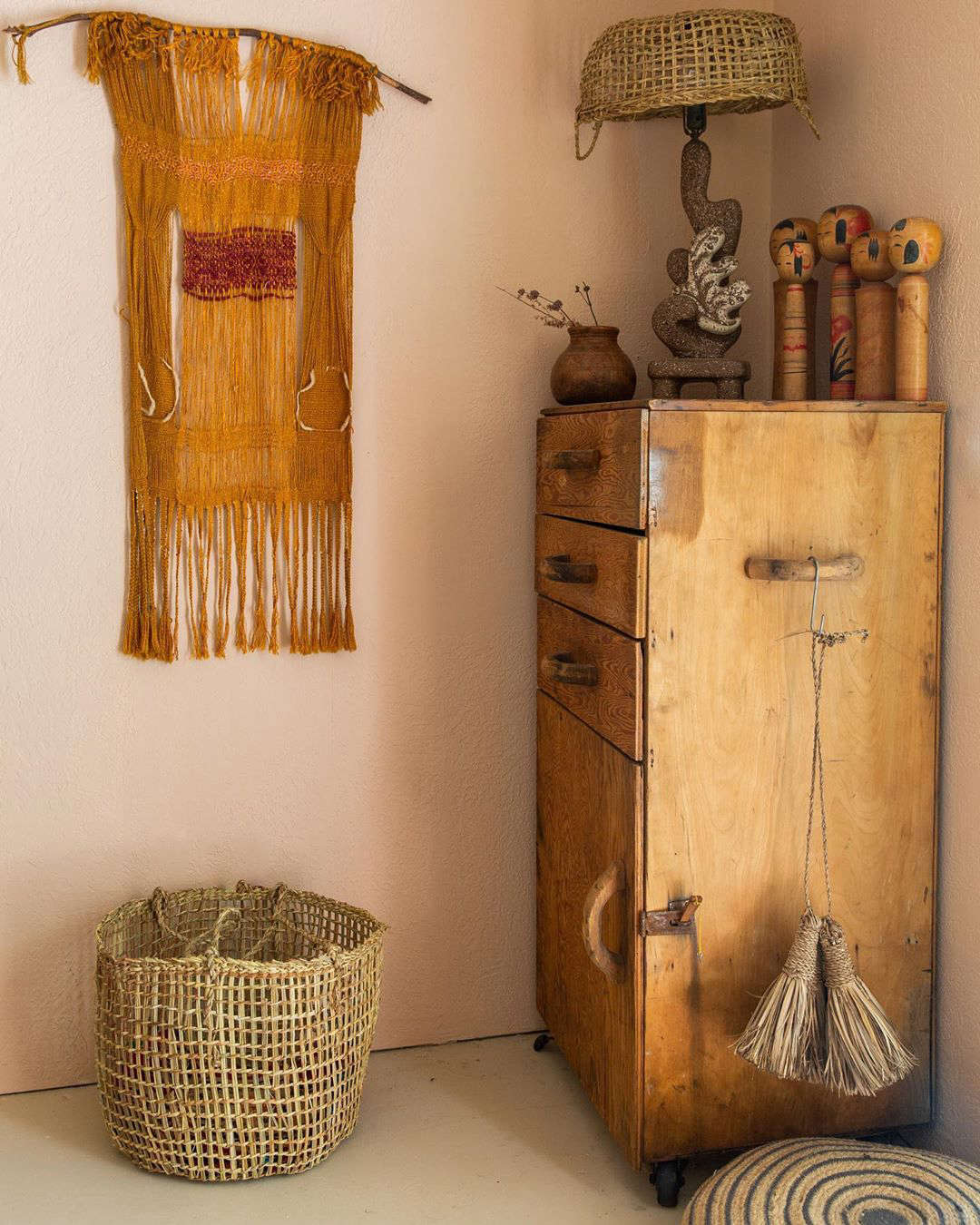 A quiet corner of a bedroom, expertly decorated with texture and patina.