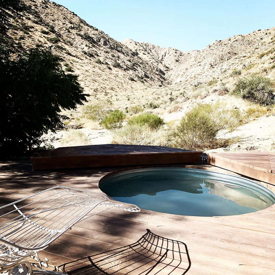 A stock tank pool was inserted into the multi-tier deck for refreshing dips.