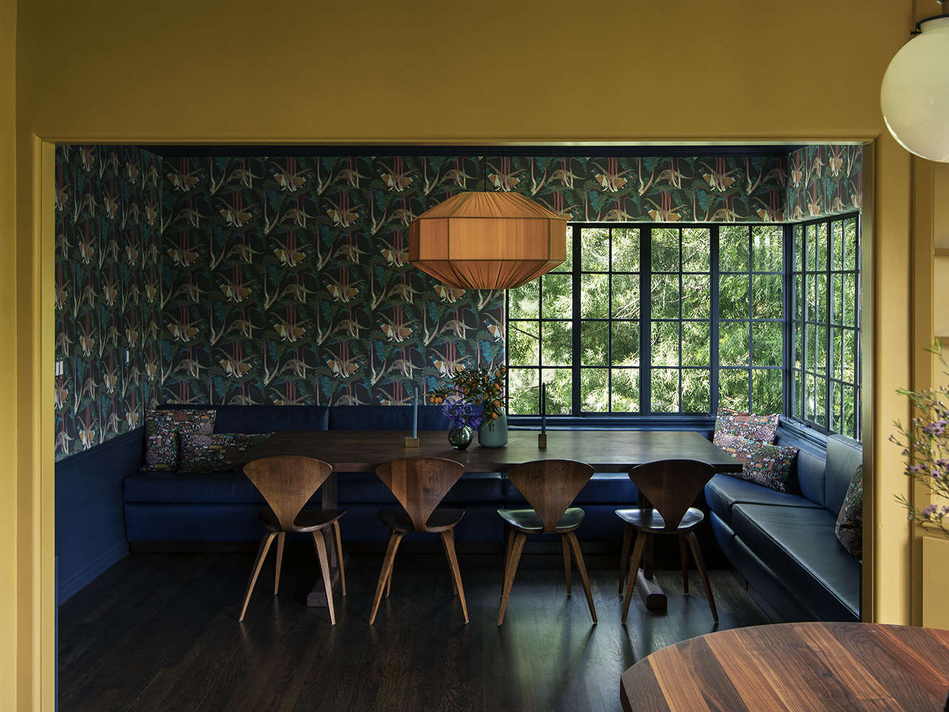 The dining area, on the other side of the kitchen. 
