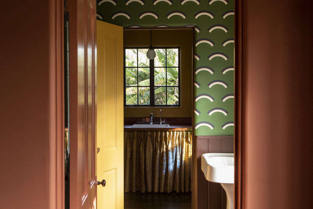 The view from the powder room into the pantry.