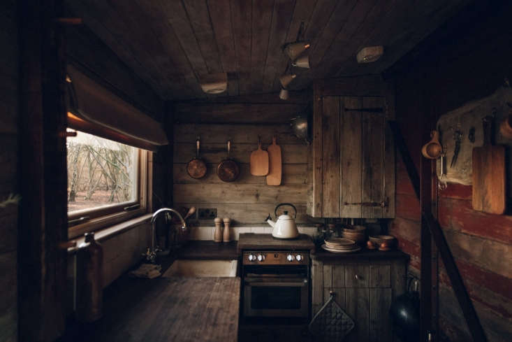 the kitchen is set in an addition in the back—the red painted boards are 20