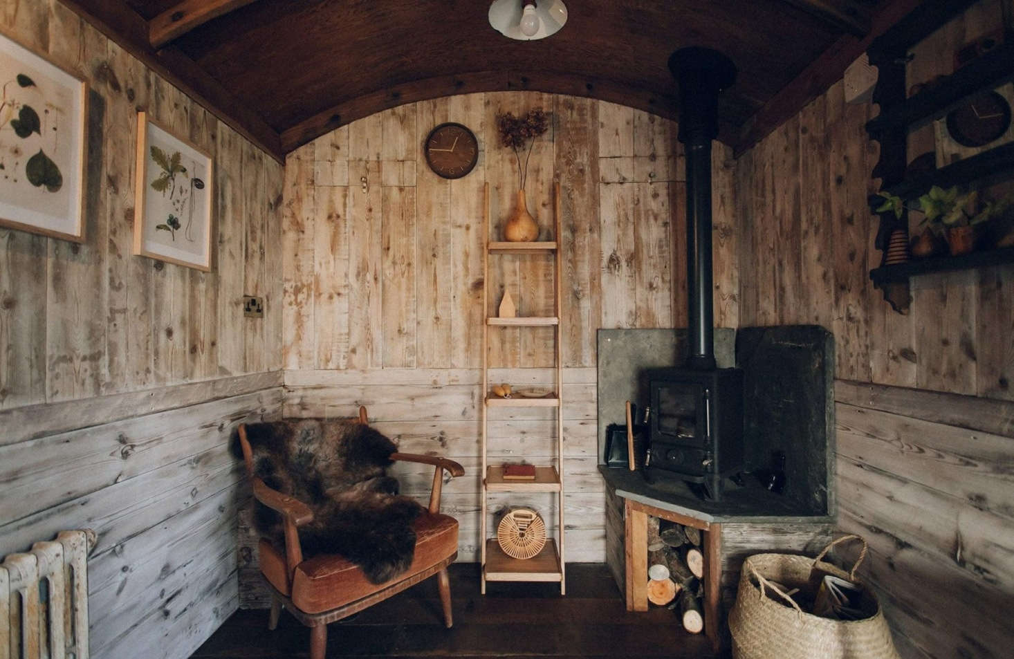 The interior has new paneling made from reclaimed wood finished with a transparent white lime wash from Bauwerk. 