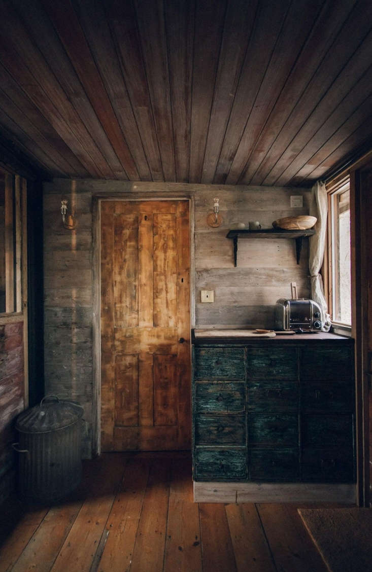 a period plank door pairs well with a set of shop drawers that the couple purch 28