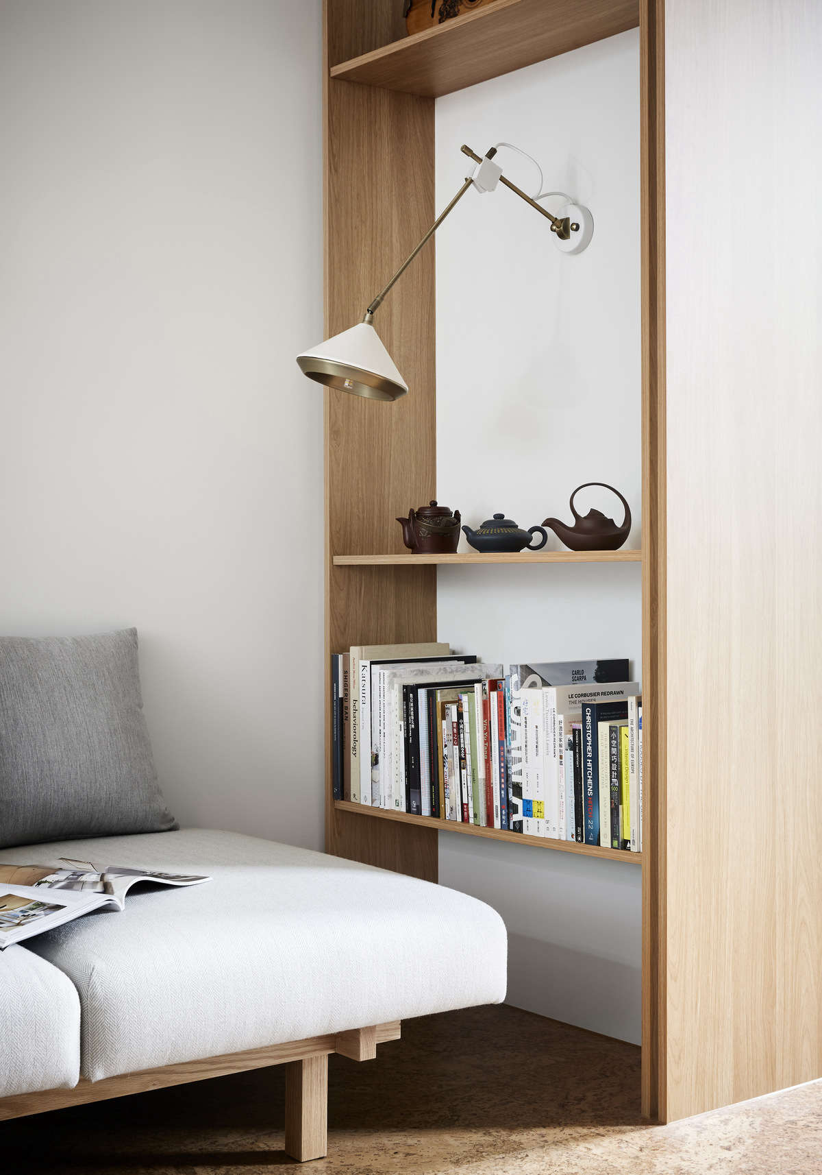 For a cohesive look, the built-in storage units in the living and dining areas are constructed from the same Laminex material used for the kitchen cabinets.