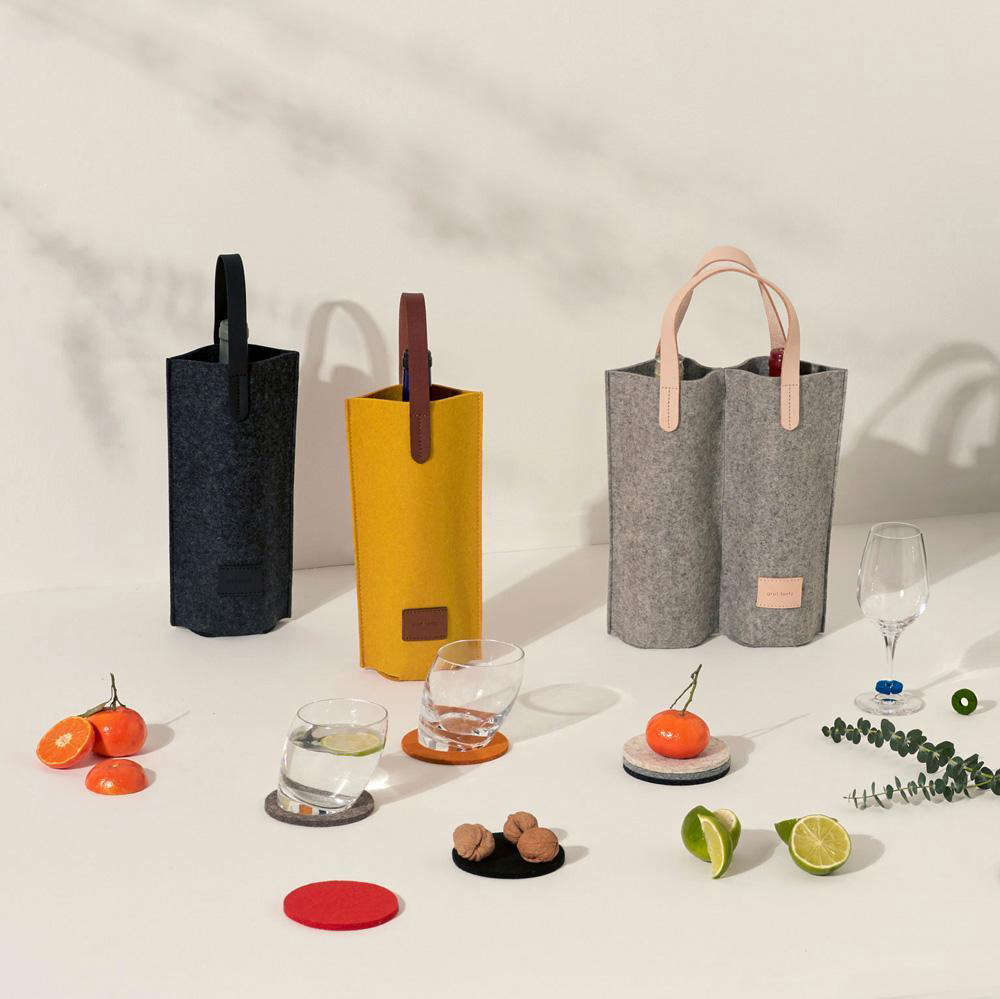 Perfect for BYO, socially distanced gatherings: the Cozy Carrier Duo in Granite by Graf Lantz ($69), sustainably made from Bavarian merino wool felt and vegetable-tanned leather trim, sure to keep bottles cool and dry.