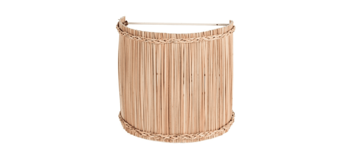 From Maison of Hand in LA: the Sconce Jonc shade is made of bulrush over a metal frame; available in two sizes (the smaller is $79, the larger is $data-src=