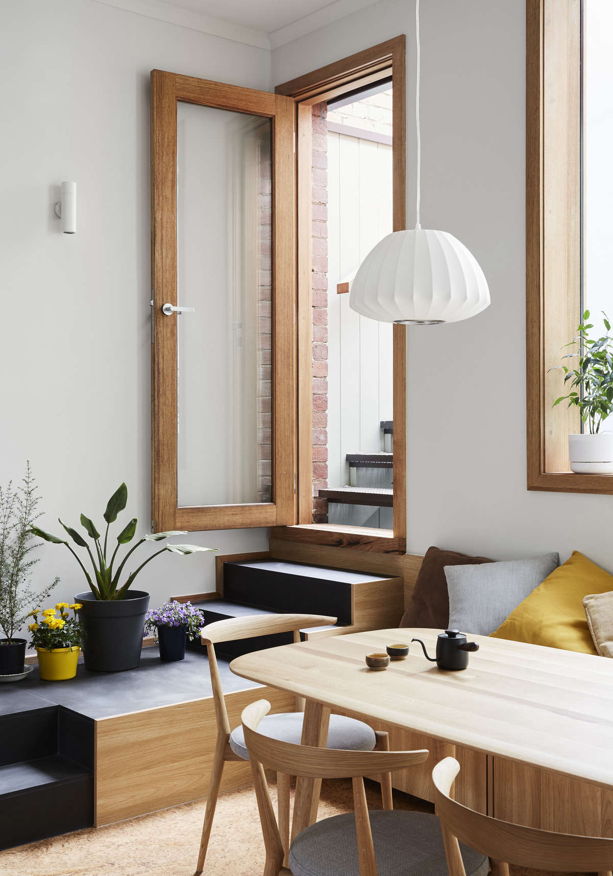 The dining table and chairs are from Japanese furniture store Apato, in Victoria.