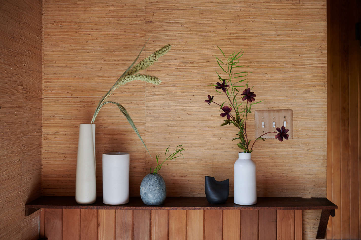 Bloomist offers an array of handmade, organically shaped vases that are every bit as thoughtful as blooms and stems they hold. From left to right: the Off-White Novah Pitcher ($45, pictured with Dried Spray Millet, $); Tracie Hervy’s White Stoneware Tall Cylinder Vase ($data-src=