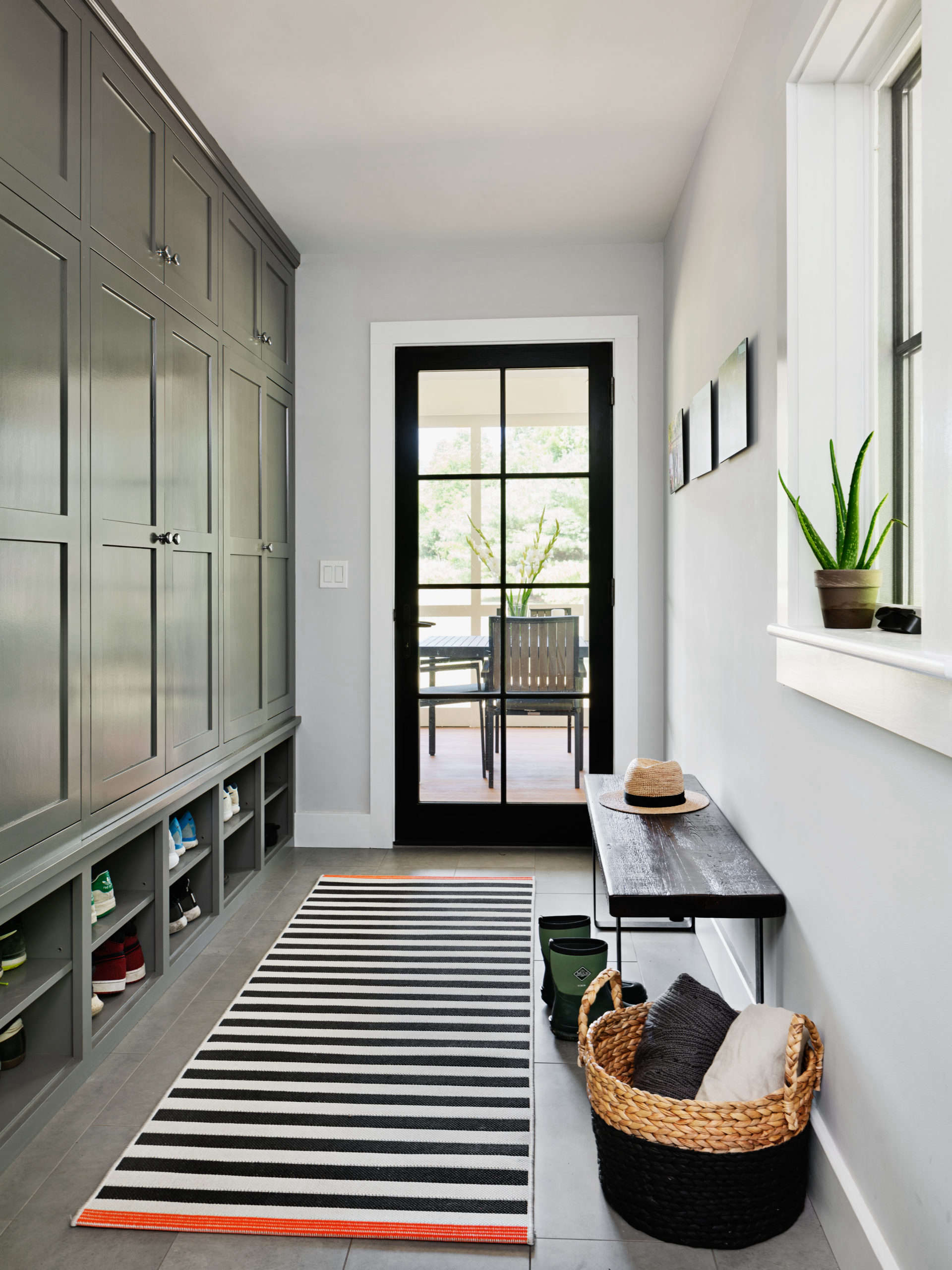The mudroom has purpose-built storage for every member of the family: the Tarts have twin boys who just finished their junior year of high school from the house. 
