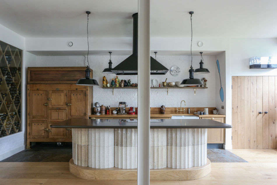 In his Bermondsey kitchen London restaurateur Mark Hix created an island out of salvaged cast concrete columns sourced from Remodelista favorite Retrouvius. Hix worked with 