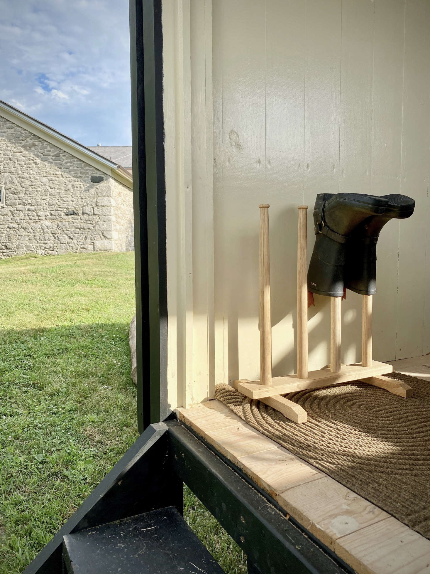 The Oak Boot Stand is another Minka offering (find more like it in our Easy Pieces post Boot Racks for Wellies). The Sand Doormat evokes a Zen garden; it