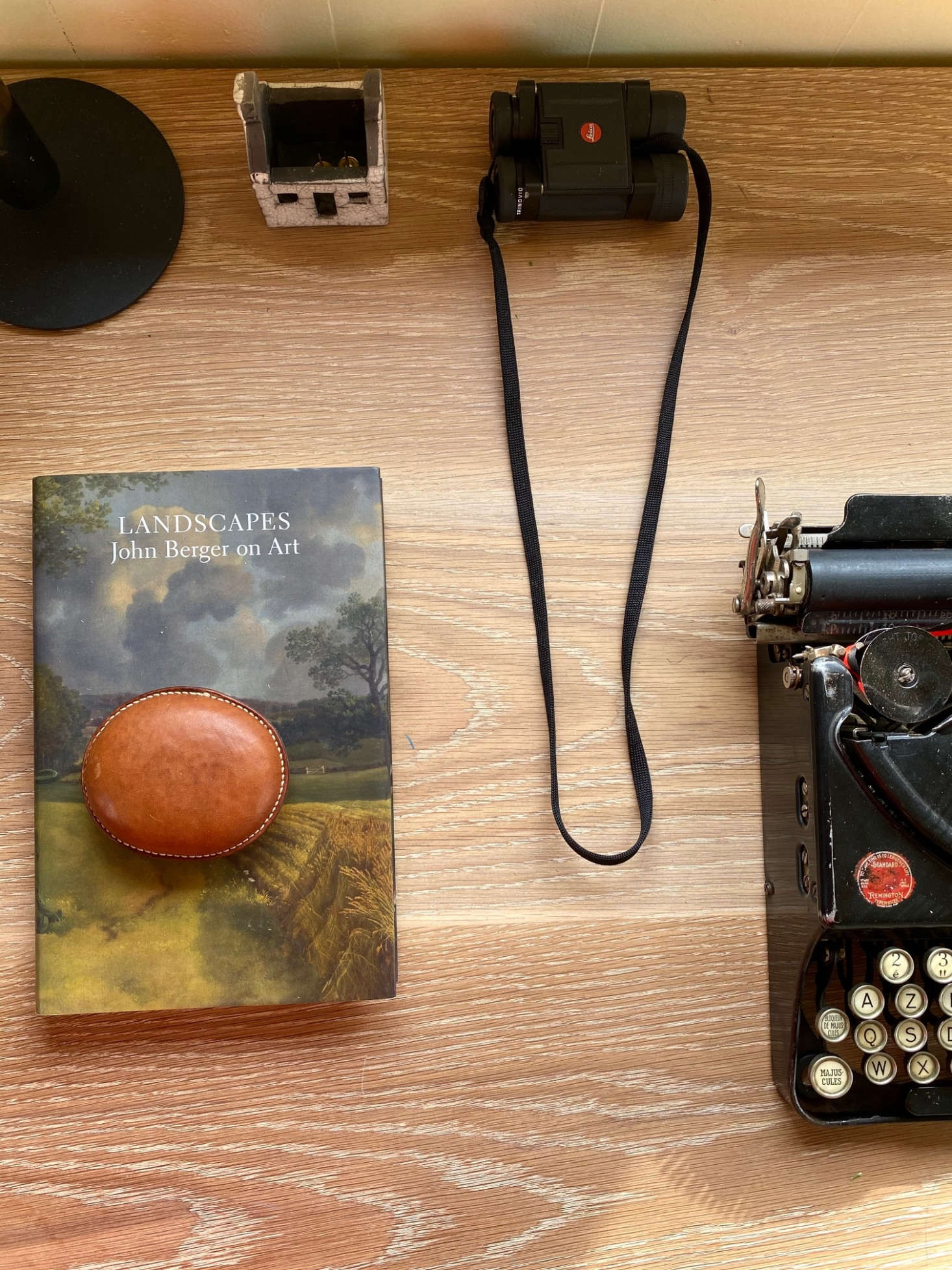 John and Juli use the hut to take phone and video calls; their kids come to play with the typewriter and draw. 