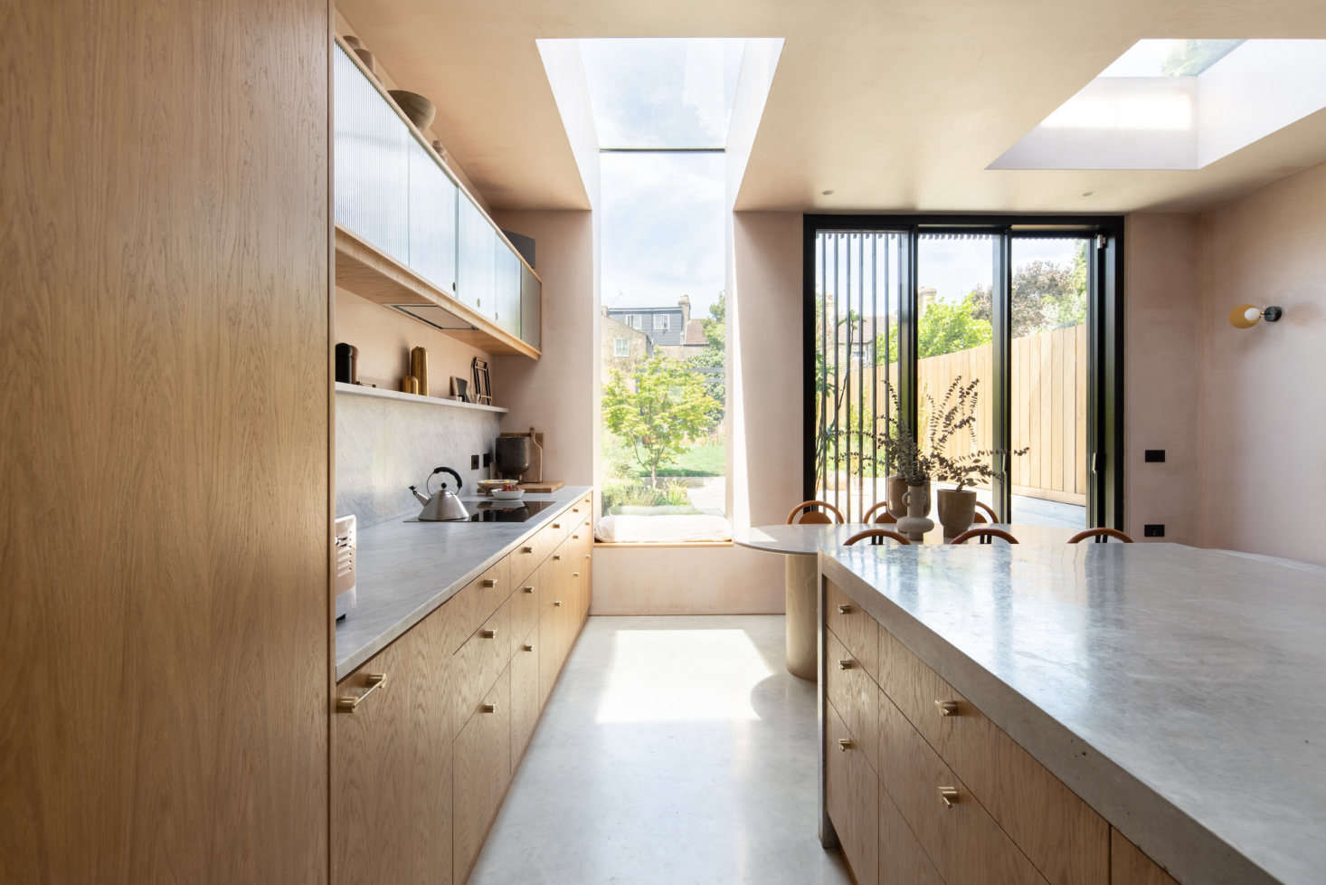 The backyard is on the other side of the kitchen, directly across from the tsubo-niwa.