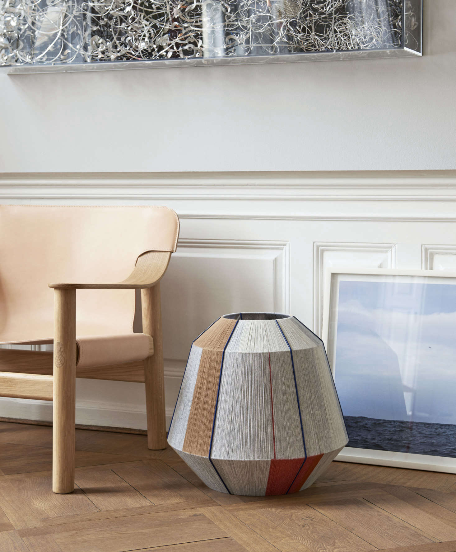 Each BonBon Shade ($545) is hand-wrapped in colored yarn and is one of a kind, designed by Ana Kraš (a longtime Remodelista favorite) for Hay. Alongside is the Bernard chair ($