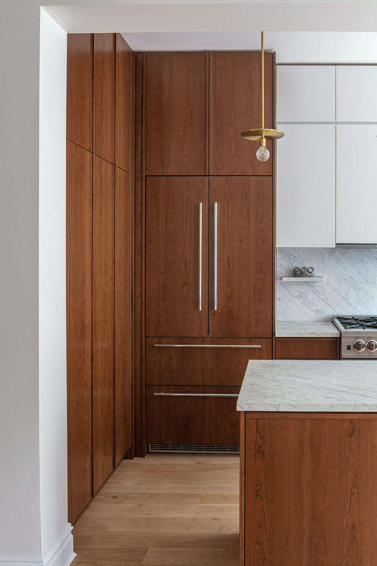 The fridge is a 36-inch-wide, panel-ready Liebherr.