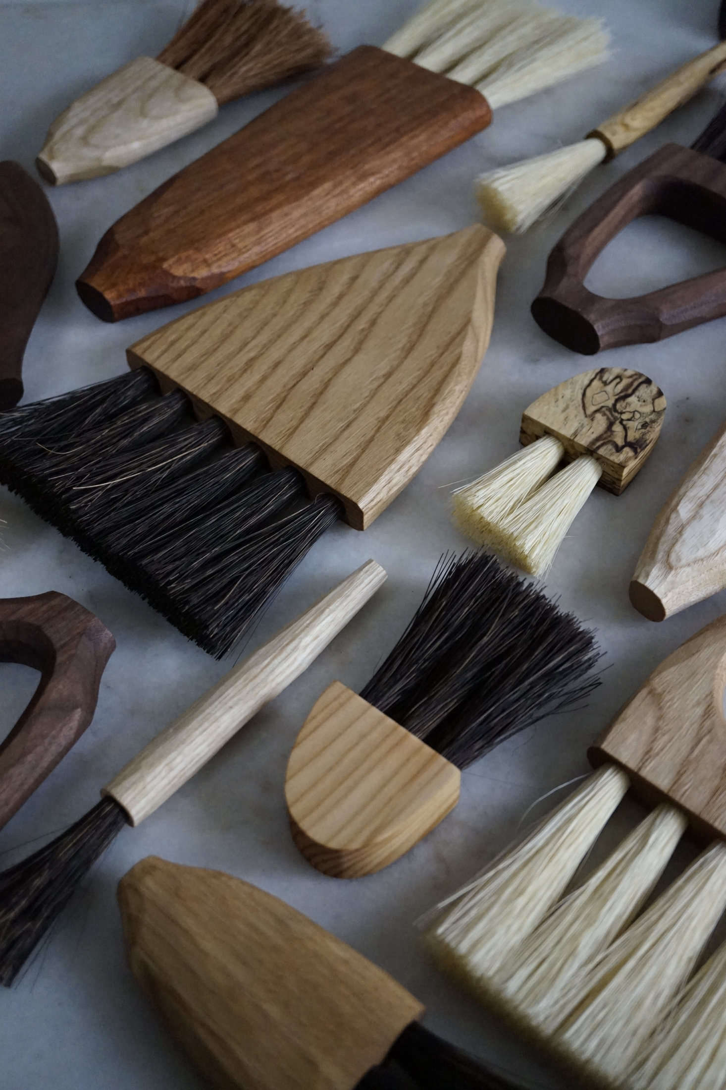 A collection of Sophie Sellu brushes. See more in the Grain & Knot shop—everything is currently sold out but new pieces will be offered at the end of the month: watch for the alert @grainandknot. To appreciate her process, watch Sophie making a wooden spoon here.