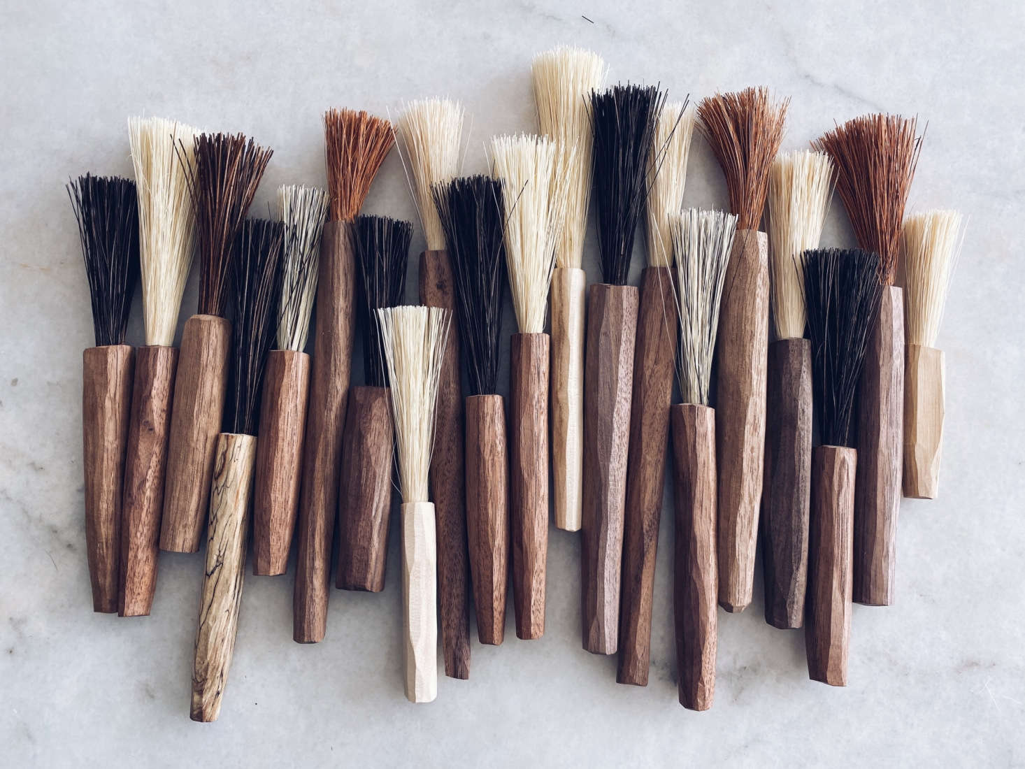 When sawdust became a part of her daily life, Sophie started carving brushes with bristles of plant-based fibers. 