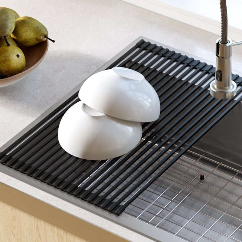 The Stainless Steel Over the Sink Multipurpose Roll-Up Drain Tray by Kraus is $.95 from Wayfair.
