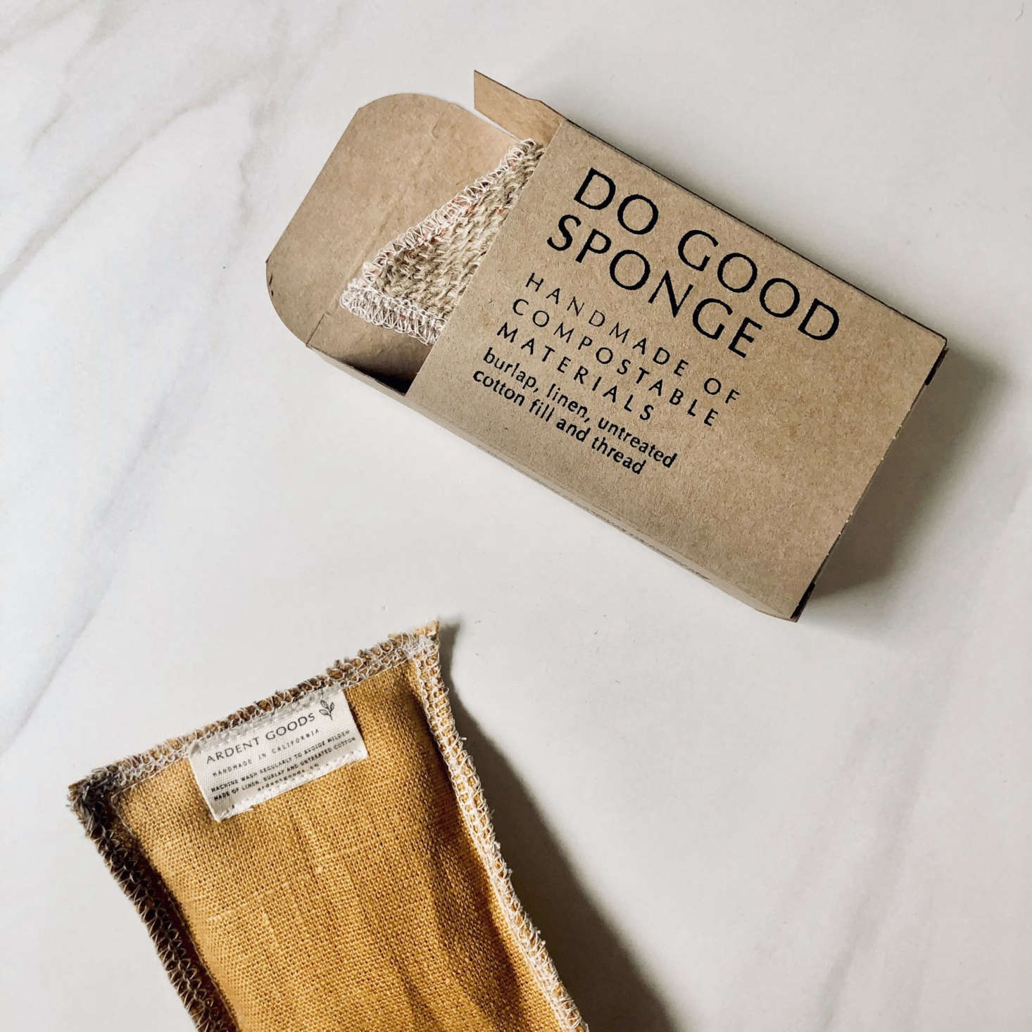 The Do Good Sponge Set. Made with eco-friendly materials, the burlap and cotton fill can both be composted. Six different colors available (pictured is Burlap Harvest Yellow); $