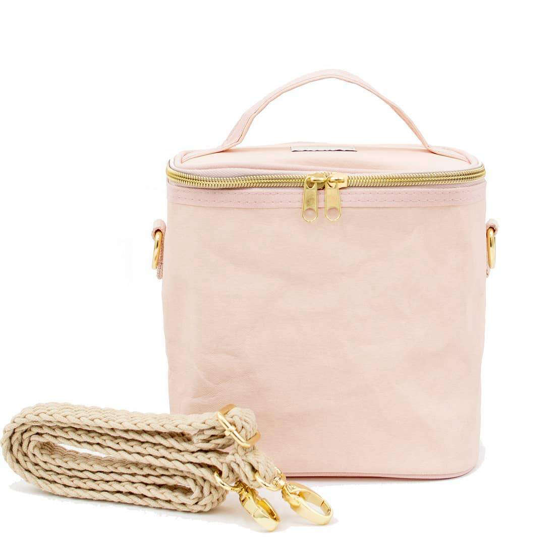 The Petite Poche Paper Lunch Bag. Includes a removable insert for easy cleaning and a messenger strap. Offered in four different colors; $33