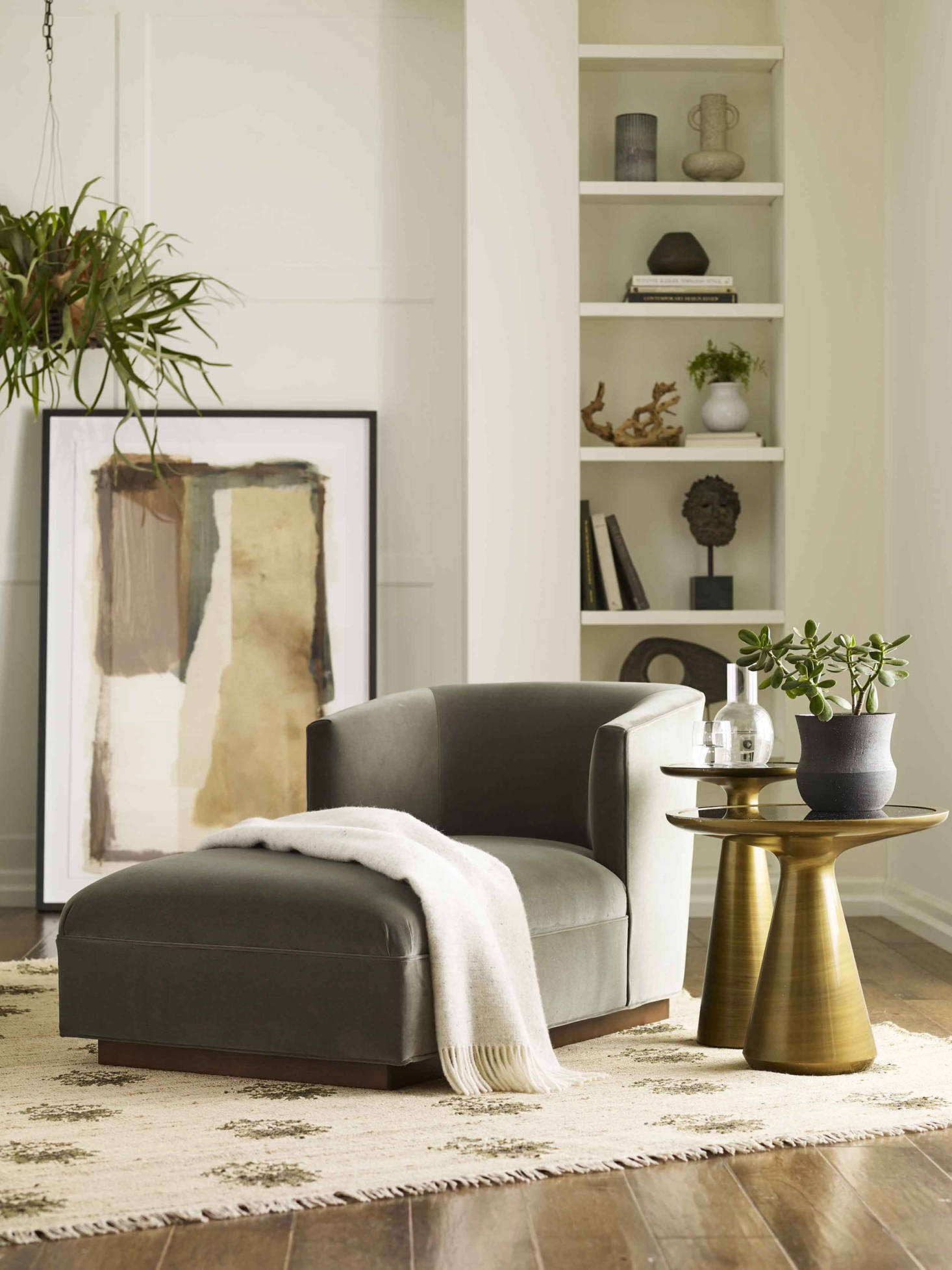 Add a Cooper Chaise to a corner of the bedroom or living area and you have a ready-made retreat for a bit of calm and quiet. This one is shown in “fern”-hued velvet, paired with the sculptural Addie Side Table and Addie Pull-up Table in bronze and the hand-knotted Disha Rug (one of four new rugs made in collaboration with sustainable rug maker Obeetee).