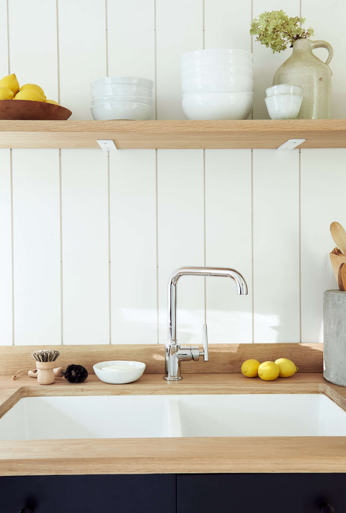 The white oak countertop and shelving was made by his best friend from elementary school.