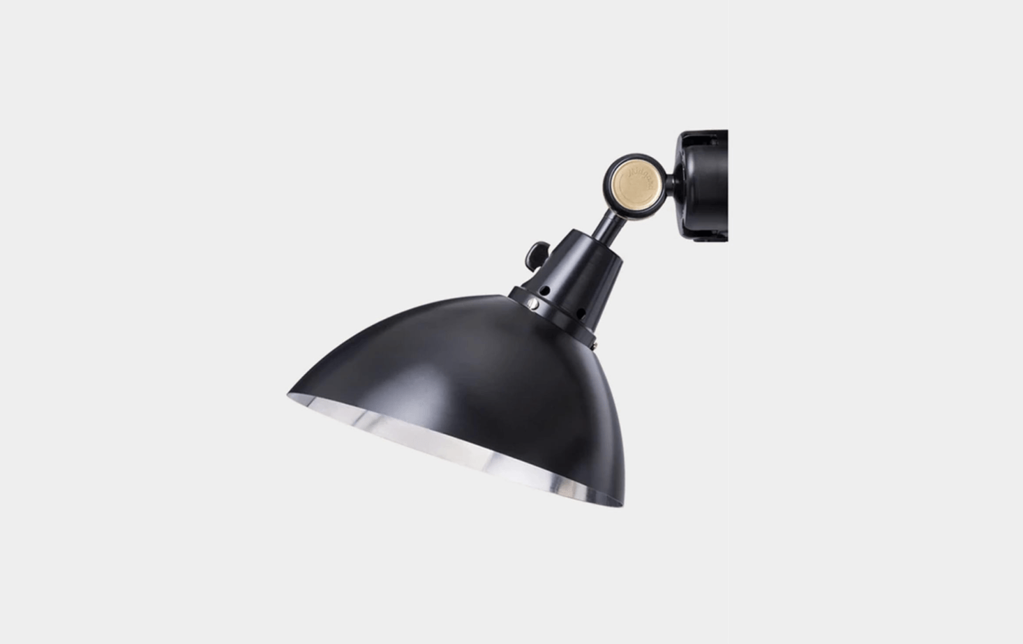 The Modular 555 Wall Light in black from Design Quarters. Materials include powder-coated aluminum and textile cord; $730