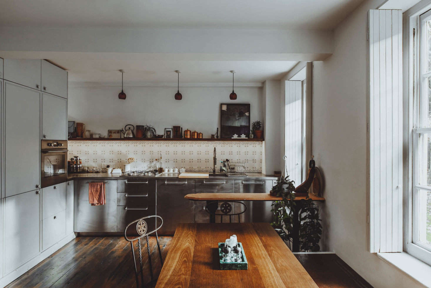The kitchen fills one end of the main room. 