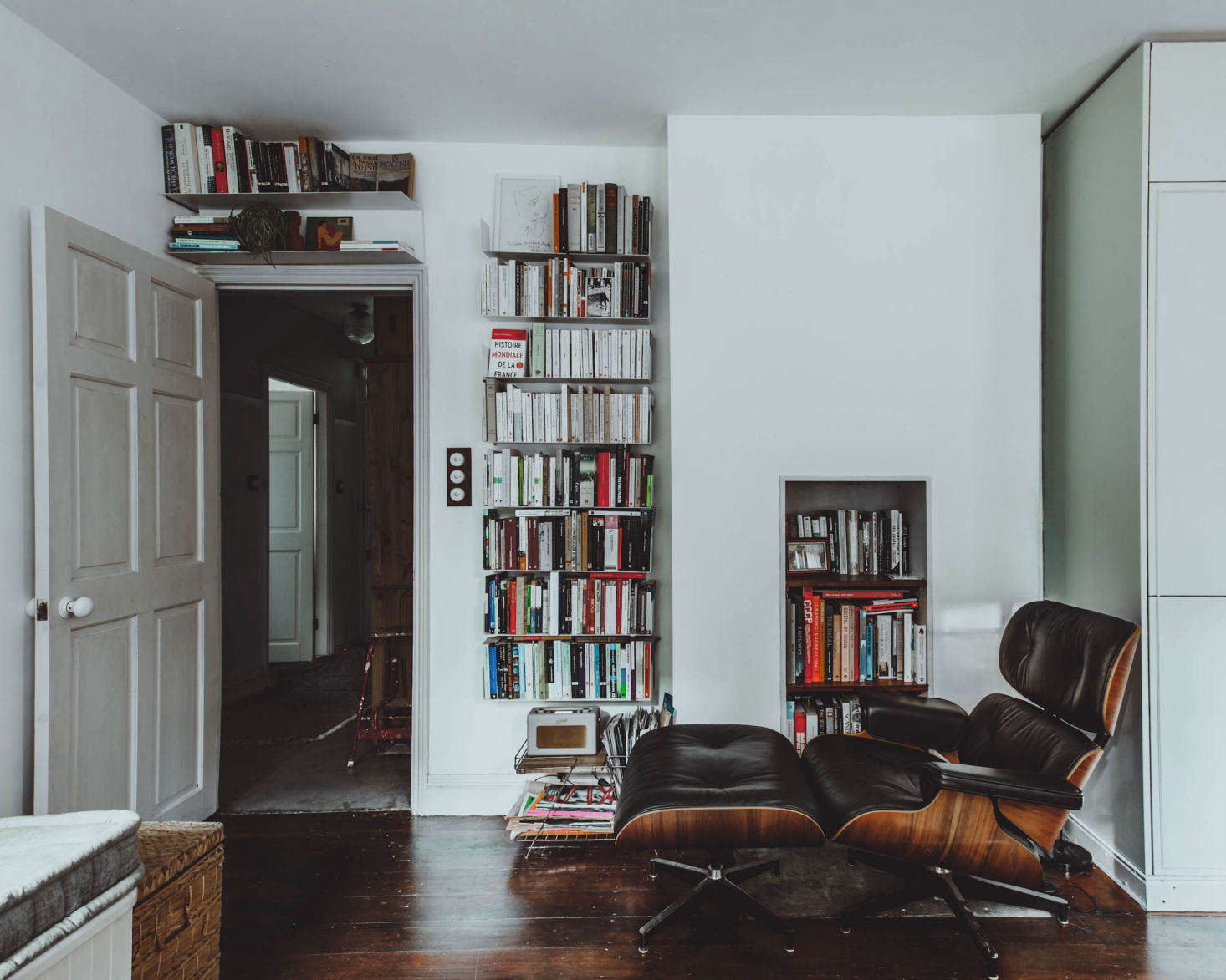 Books fill much of the opposite wall.
